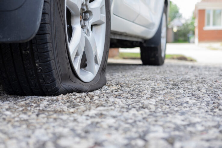 Close-up of a flat tire